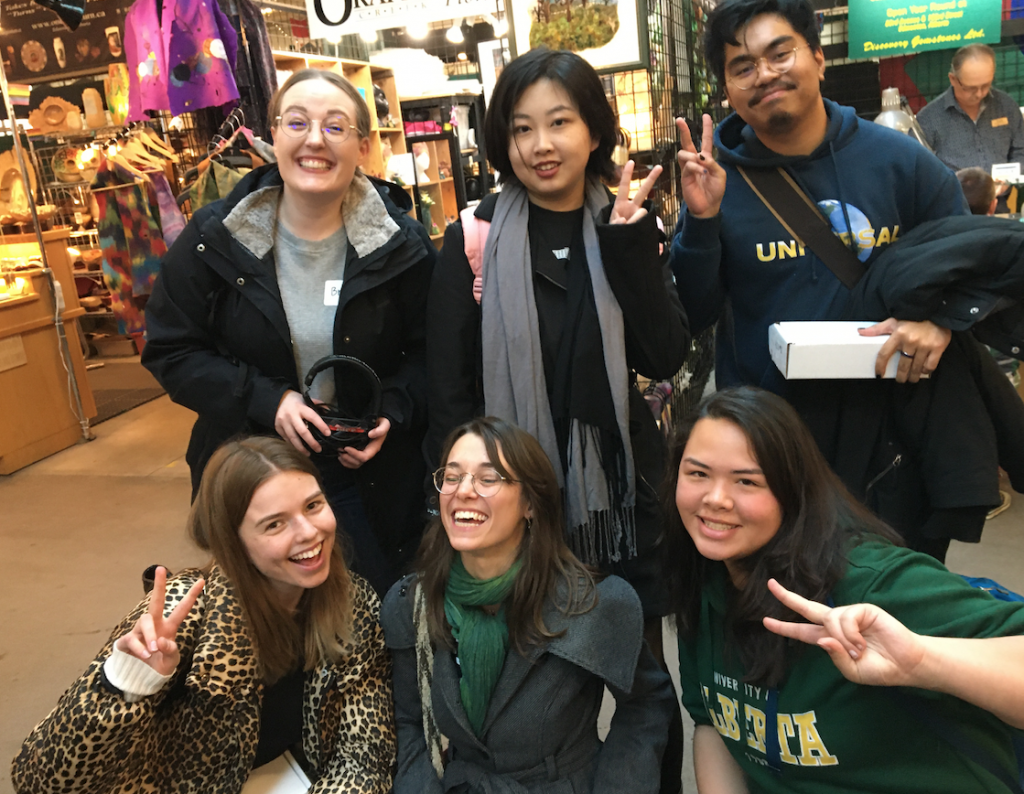 Brandi, Sophia, Dan, Melania, Katelin, and Kyla at the farmers market